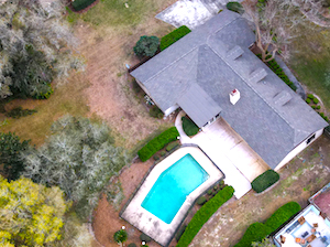 Drone view of home, pool